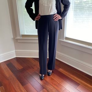 Ladies pantsuit. Fully lined jacket. 2 button 2 pockets. Wide legs. Dark grey.